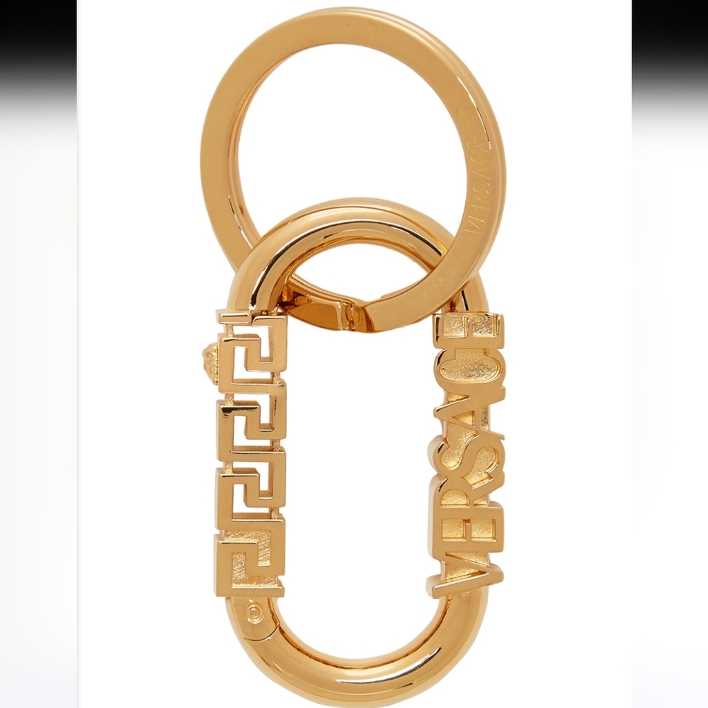21. NEW IN BOX VERSACE GOLD GRECA LOGO KEYCHAIN